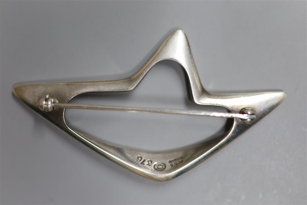 A Georg Jensen 925 openwork abstract brooch, designed by Henning Koppel, no. 376, 68mm, gross 17.4 grams.